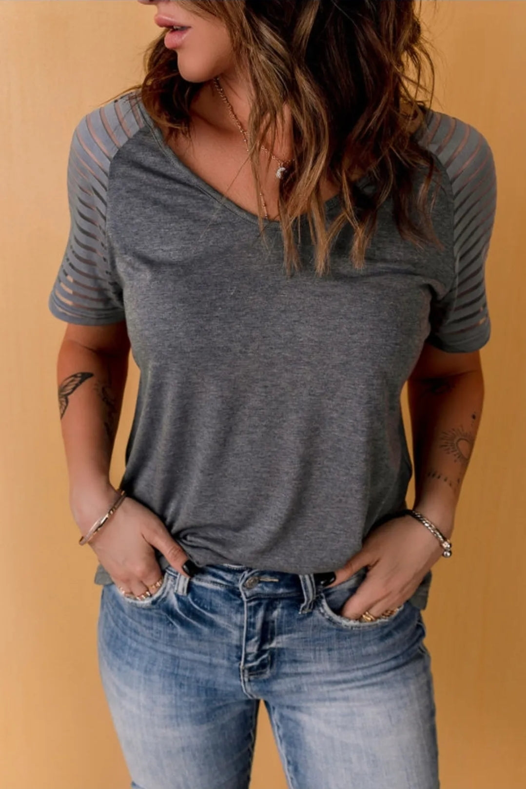 Blusa con Mangas Translucidas en lineas